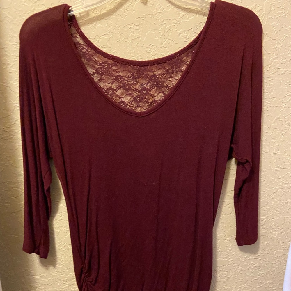 Small women’s blouse with lace back